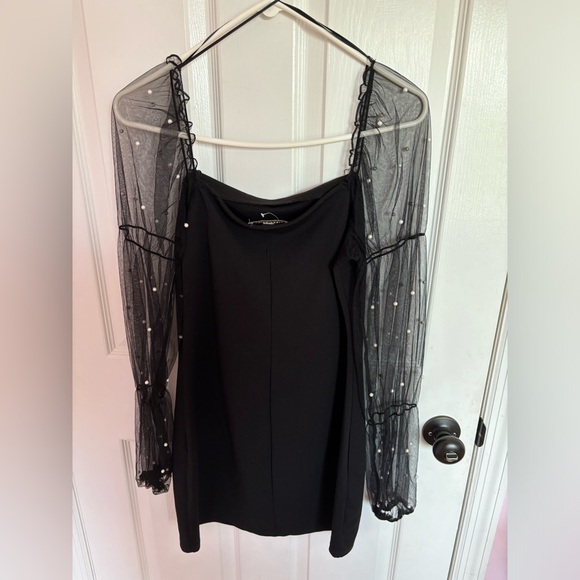 Black mini dress with long mesh sleeves and attached pearls - Picture 3 of 3